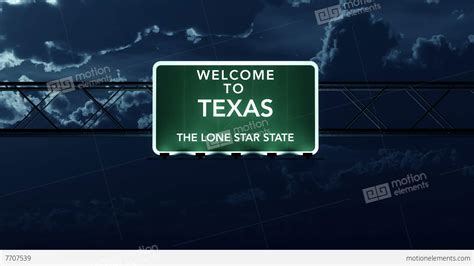 4k Passing Texas Usa State Border Welcome Road Sign At Night With Matte