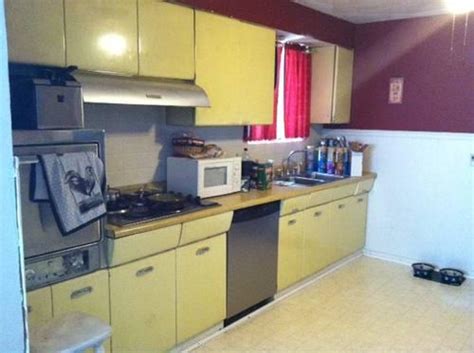 Spacious rooms, finished ll w/modern wood burning fireplace. 1950's/1960's STEEL CROSLEY Kitchen Cabinets & Original ...