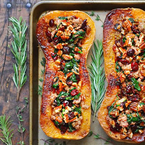 Sausage Stuffed Butternut Squash With Spinach Pecans And Cranberries