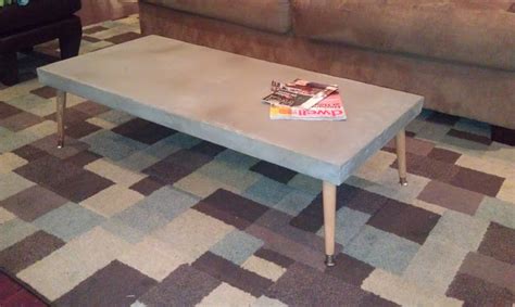 The wood was free and i had the deck stain left over from restaining our deck, so out of pocket for this project was around $65. DIY Concrete Table - Dave and Kelly Davis