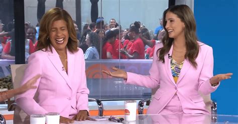 today hosts hoda kotb and angie lassman have a laugh over matching pink outfits we re