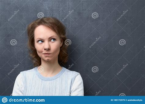 Portrait Of Young Woman Imagining Something In Mind Stock Image Image