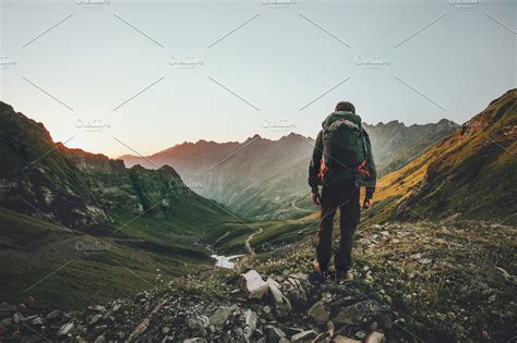 Man Hiking At Sunset Mountains High Quality People Images ~ Creative