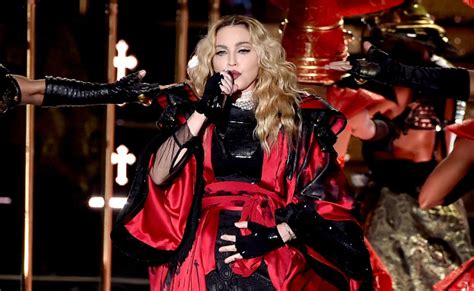 madonna avoids controversy after exposing 17 year old fan on stage