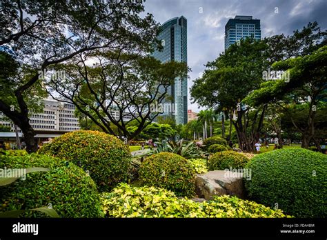 Gardens And Skyscrapers Seen At Ayala Triangle Park In Makati Metro