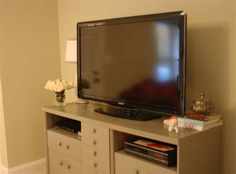 He starts by building a plywood box that will hold the television and then proceeds to build the cabinet doors and face frames. A Homemade Nest: DIY dresser turned TV stand