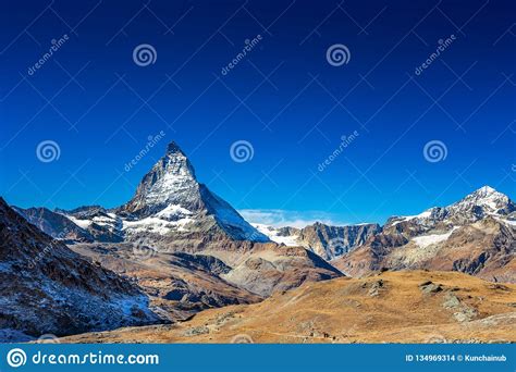 Matterhorn Peak Mountain In Summer With Clear Blue Sky And Day Moon At