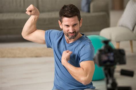 Young Handsome Man Showing Muscles Stock Image Image Of Young