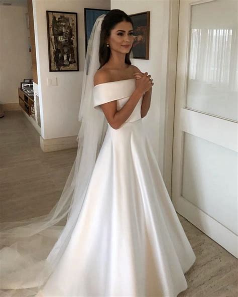 Find a unique dress for your wedding on ucenterdress to make it unforgettable. Princess Style Off Shoulder Satin Wedding Dresses 2019 ...