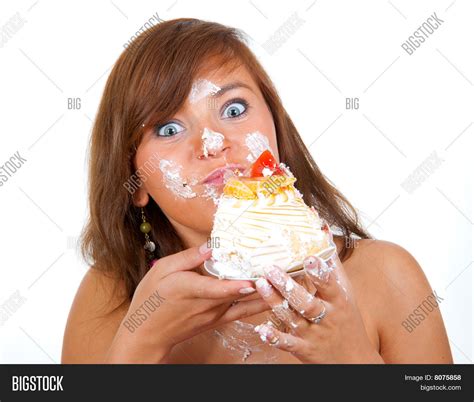 girl eating cake his image and photo free trial bigstock
