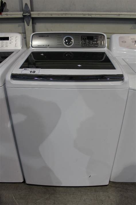 The washer automatically selects the optimal wash conditions by sensing the weight of the laundry. SAMSUNG AQUAJET VRT WASHING MACHINE