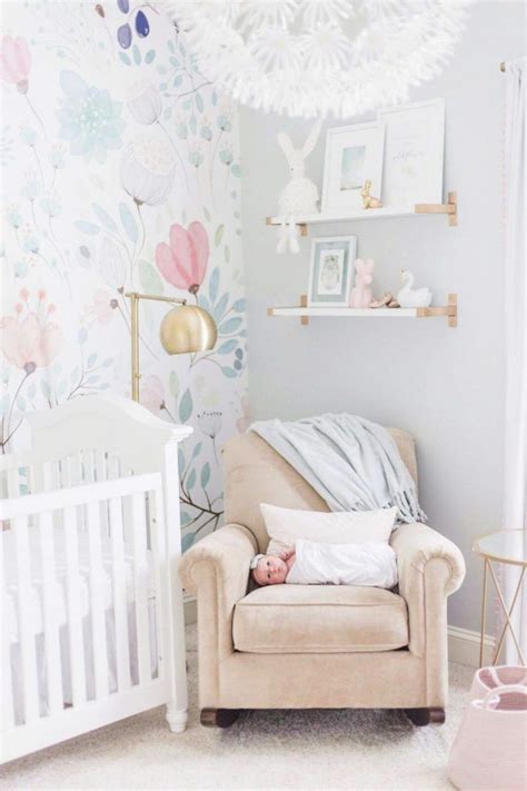 We Love This Little Girl Nursery With Watercolor Floral Wallpaper That