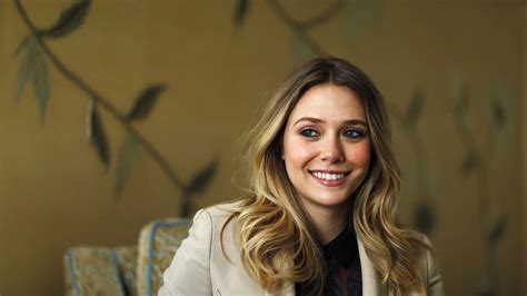 Download Elizabeth Olsen Stunning Smile Wallpaper