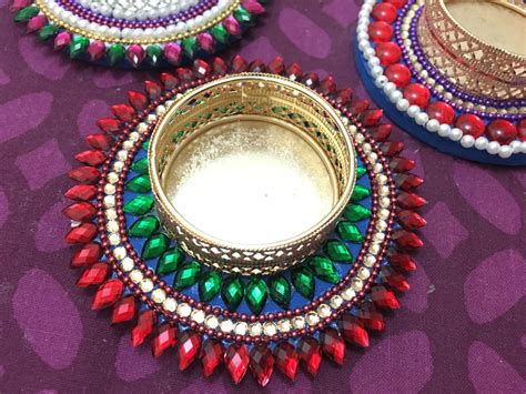 Make these kundan rangolis with limited supplies and adorn your doorsteps this festival season. Kundan work floating diya for sell | Indian wedding ...