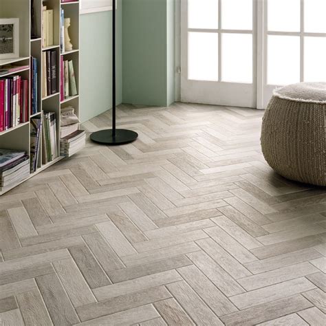 Wood effect ceramic floor tiles herringbone. Herringbone White | Herringbone wood, Herringbone tile ...