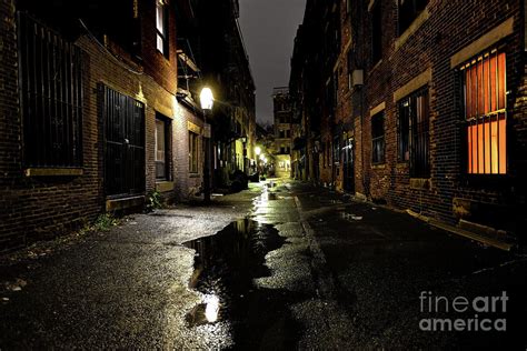 Long Dark Urban Alley Between Two Old Buildings Photograph By Denis