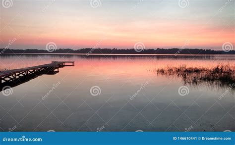 Sunset Of The Sun Lake Dock Stock Image Image Of Dock Sunset 146610441
