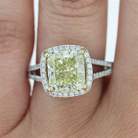 Yellow diamond engagement rings also come in a variety of shades to fit any taste. 18k White Gold Fancy Yellow Cushion Cut Diamond Engagement ...
