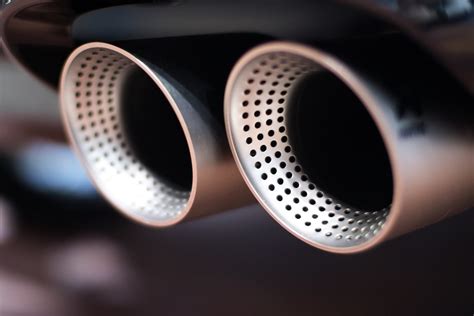 Close Up Of A Dual Exhaust On A Sports Car Ivan Radic Flickr