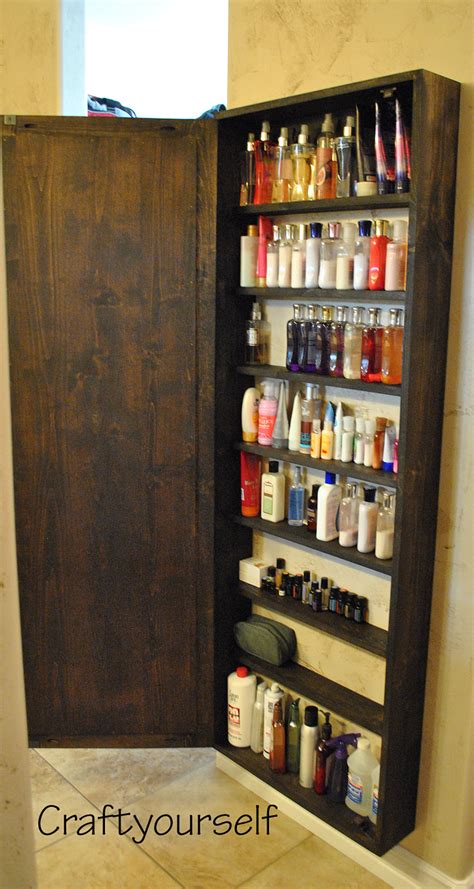 Storage doesn't have to be stark. DIY Bathroom Cabinet with Mirror - Craft
