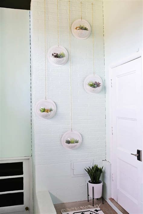 I ended up creating my terrarium outside because of this. Hanging Terrarium Wall DIY - A Beautiful Mess