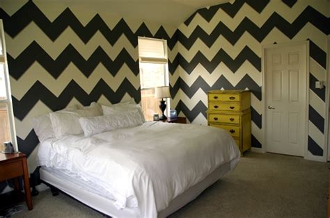 For a subtle nod to the classic zig zags, consider wood grain that mimics the pattern want to bring chevron furniture to the bedroom? Mastering the Master Bedroom {Chevron Walls} - Makely