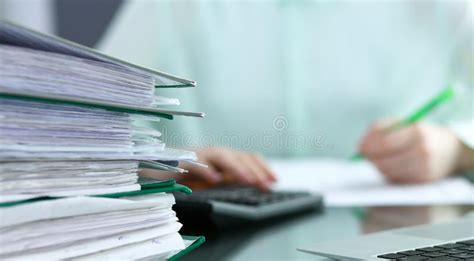 Bookkeeper Or Financial Inspector Making Report Calculating Or