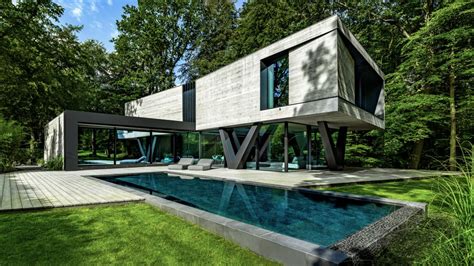 Modern House Resembles An Abstract Sculpture In The Midst Of The Forest