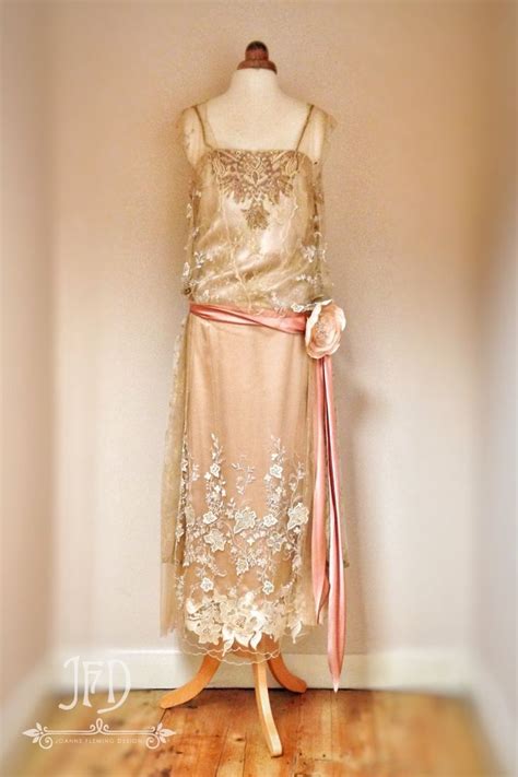 A Beautifully Detailed Silk Satin Dress With Embroidered Tulle And