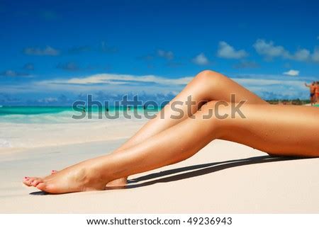 Women S Sexy Legs On The Beach Stock Photo 49236943 Shutterstock