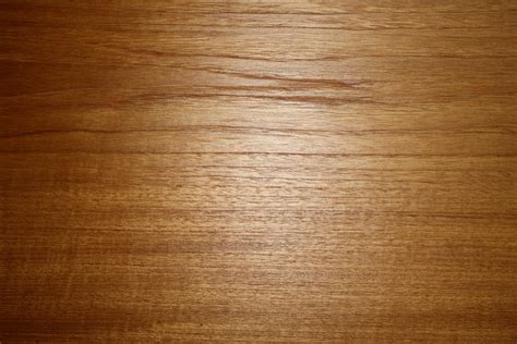 A Close Up View Of A Wooden Surface With Some Light Colored Wood Grains