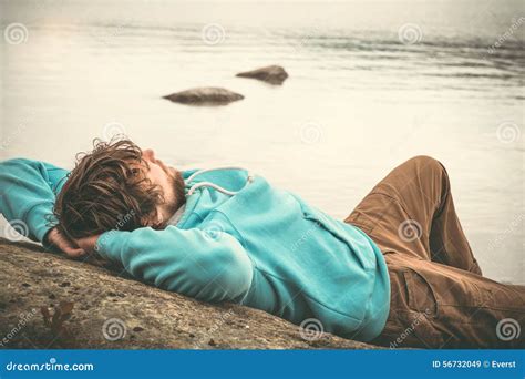 Young Man Laying Relaxing Outdoor Stock Image Image Of Leisure