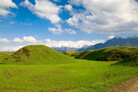 Beautiful Spring And Summer Landscape Lush Green Hills High Snowy