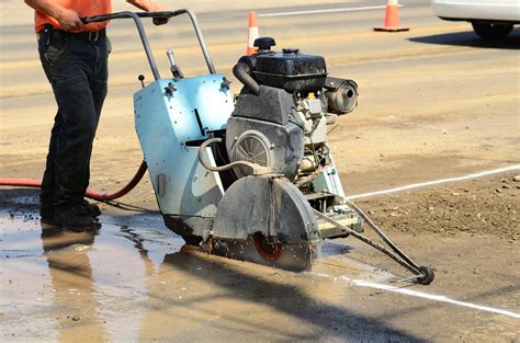 A huge water cooled cutting saw attaches to each rail and is slowly moved up and down the rails. Reducing Harmful Dust Emissions by Wet Cutting Concrete