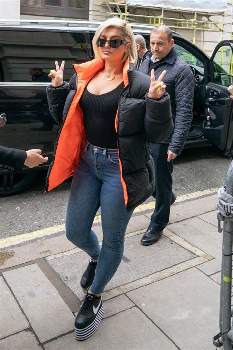 Bebe Rexha Rocks A Black And Orange Puffer Jacket Jeans With Nike