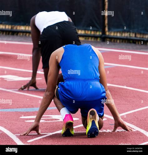 Male Sprinters On Starting Blocks Hi Res Stock Photography And Images
