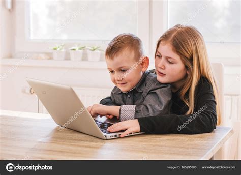 Kids Playing On Computer — Stock Photo © Bnenin 165995306