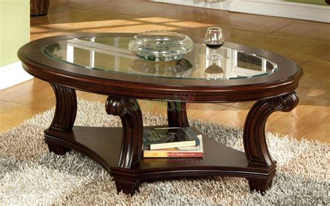 This coffee table has a timeless style, with its glass table top. 30 Collection of Oval Glass and Wood Coffee Tables