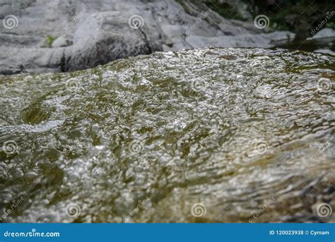 Pure Mountain Water Flowing Over Mineral Stones And Rocks Natural