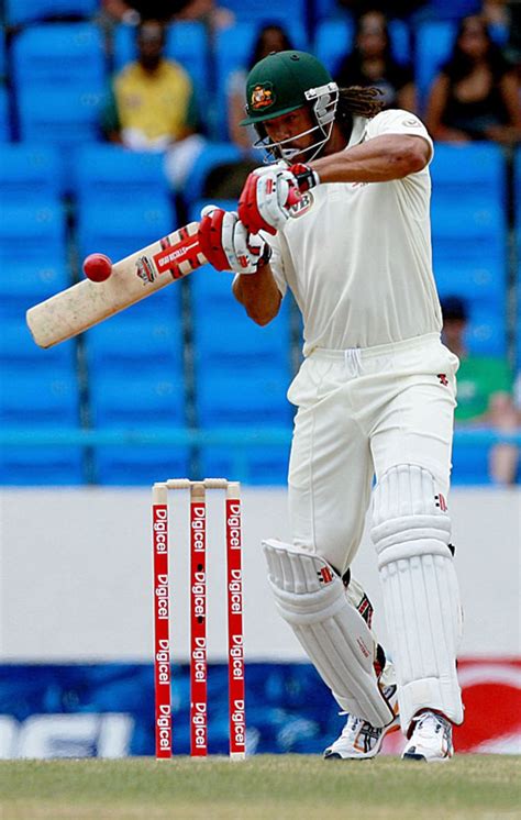 Michael Clarke Keeps His Eye On The Ball While Driving Down The Ground