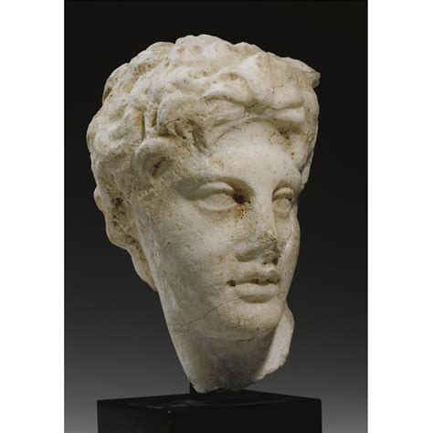 73 A Roman Marble Head Of A Youth Circa 2nd Century Ad