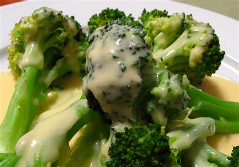 Roasted Broccoli Covered With Cheese Sauce Women Daily Magazine