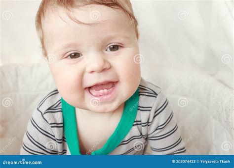 Portrait Of Joyfil Happiness Baby In The Bedroom Soft Focus