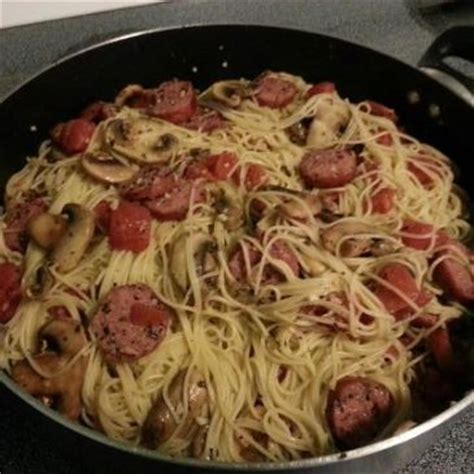 Stir in cooked pasta and marinara sauce. Pasta and smoked sausage Recipe | SparkRecipes