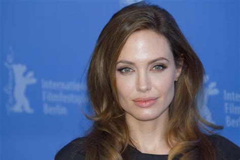 Angelina Jolie Holds Back Tears While Dropping Son Maddox Off At