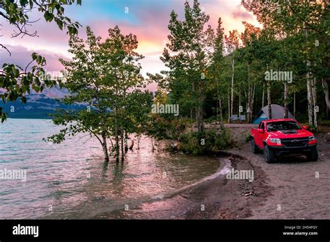 The Perfect Camping Spot On Abraham Lake With Trees Tent And Truck