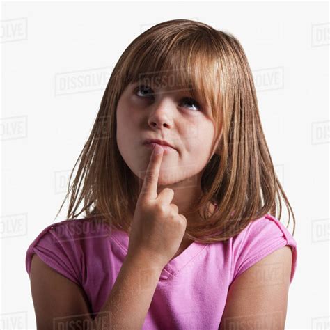 Portrait Of Young Girl Thinking Stock Photo Dissolve