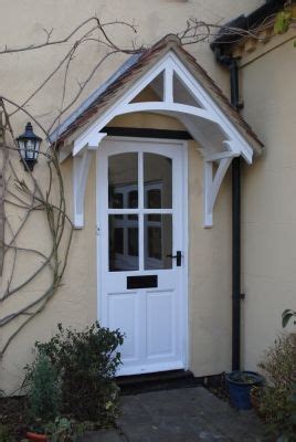 The best door canopy protects your door from the heavy snow or the rain and the direct sunlight falling on you. Timber door canopies- traditional cottage canopies - front ...