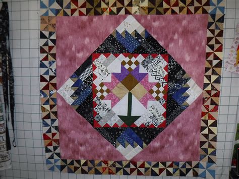 Half a log means half the time in making it, but looks like a whole lot more!fabric by timeless treasures called dominicana Half log cabin surrounds flower and used scrap pinwheels ...