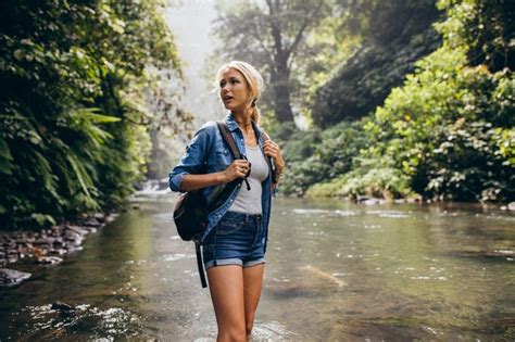 Beautiful Woman With Backpack Containing Active Adventure And